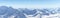 White snowy winter Caucasus mountains at sunny day. Panorama view from ski slope Elbrus, Russia