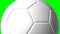 White soccer ball on green chroma key background.