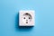 White socket isolated on a blue background. Electric lighting