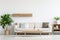 White sofa against unit. Minimalist luxury home or hotel interior design of modern living room