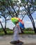 White sorban grandpa go prayer with colorfull umbrella