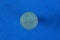 white soviet coin fifty kopecks on blue background