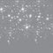 White sparks shine with special light, sparkles on a transparent background. Christmas abstract pattern. Sparkling magical dust p