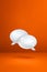 White speech bubbles on orange vertical background