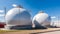 white spherical tanks for storing hydrogen gas at outdoor storage facility, neural network generated image