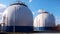 white spherical tanks for storing hydrogen gas at outdoor storage facility, neural network generated image