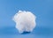 White sponge on blue background