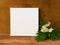 White square canvas in interior.