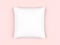 White square pillow isolated on pink background.