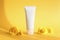 White squeeze bottle cosmetic cream tube and marigolds flowers on yellow background with shadow. Front view. Unbranded lotion,