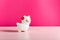 White Squishy Llama on bright pink background