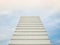 A white staircase stretches up the horizon. That means to be success or go to heaven