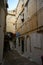 White stairs and old houses in medieval small touristic coastal town Sperlonga, Latina, Italy on sunrise