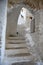 White stairs and old houses in medieval small touristic coastal town Sperlonga, Latina, Italy on sunrise