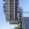 White stairs with potted plants against clear sky