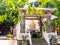 White statue of Buddha in the courtyard of the temple Gangaramaya, Colombo, Sri Lanka