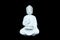 The white statue of the calm sitting buddha
