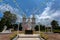 White statue of church of Saint Anna Nong Saeng and prayer colorful flags  at Nakhon Phanom Province, Thailand