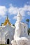 White statue in front of Settawaya pagoda in Mingun