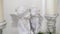 White statues of two kissing angels. The Big Day. Antique statue of angels