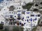 White step stone buildings blue windows Santorini island greece