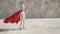 A white stick figure as superhero with red cape
