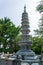 White stone with angel image crafted  Chinese buddhism pagoda at Haedong Yonggungsa Temple  in Busan, South Korea.The Korean word