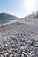 White stone beach of Albir with view on the promenade and mountain, Costa Blanca, Spain