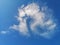 White strange clouds in the blue sky natural background beautiful nature environment space for write