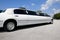 White stretch limousine