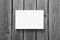 White stretched canvas mockup on wooden wall