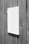 White stretched canvas mockup on wooden wall