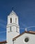 White stucco church top