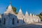White stupas around Kuthodaw pagoda in Mandalay, Myanm