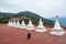 White stupas with golden tops and part of the the buddhist Sakya Monastery, Tibet, China