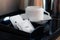 White sugar packet with coffee cup and kettle set in hotel room