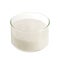 White sugar in round glass bowl