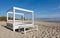 White sunbeds on the sandy Playa d\'en Bossa beach