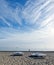 White sunbeds on the sandy Playa d\'en Bossa beach