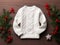 White sweater for kids on Christmas background, outerwear mockup