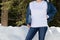 White sweatshirt mockup of a girl  in snowy winter forest, model mockup