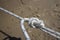 White synthetic rope knot