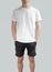 White t shirt and black shorts on a young man template on grey b