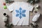 white T-shirt mockup with snowflake props christmas