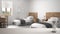 White table or shelf with crystal hourglass measuring the passing time over blurred modern bedroom with single beds, architecture