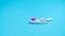 White tablets pills on blur pink tablet pill and blue background. Pharmacy banner. Pharmaceutical industry. Health insurance