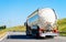 White Tanker storage truck on the asphalt highway in Poland. Business