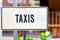 White taxis sign