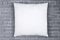 White Throw Pillow Mockup on Weathered Gray Brick