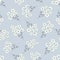 White tiny hand drawn flowers cluster bouquets on powder blue vector seamless gender neutral babies pattern print